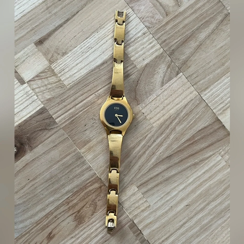 ESQ by Movado Ladies Watch Black Dial Gold Tone Bracelet and Hands